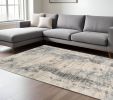 8' X 10' Ivory Blue Machine Woven Abstract Indoor Area Rug