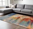 8' X 11' Blue Rust Orange Machine Woven Abstract Brushstrokes Indoor Area Rug