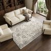 9' X 13' Ivory Machine Woven Distressed Floral Traditional Indoor Area Rug