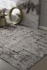 5' X 8' Ivory Grey Machine Woven Abstract Indoor Area Rug