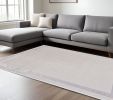 8' X 11' Ivory Silver Machine Woven Bordered Indoor Area Rug