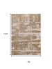 7' X 10' Ivory Gold Machine Woven Abstract Indoor Area Rug