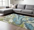 7' X 10' Teal Blue Machine Woven Watercolor Indoor Area Rug
