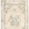7' X 9' Beige And Ivory Center Jewel Area Rug