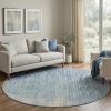 8' Blue and Ivory Abstract Power Loom Round Rug