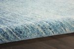 8' Blue and Ivory Abstract Power Loom Round Rug