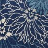 5' X 7' Blue And Ivory Floral Power Loom Area Rug