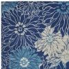 7' X 10' Blue And Ivory Floral Power Loom Area Rug