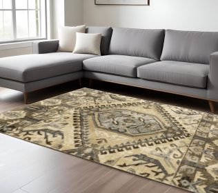 8' X 11' Tan And Gold Central Medallion Indoor Area Rug