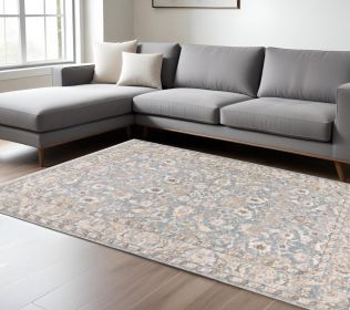 9' X 12' Blue Ivory Machine Woven Floral Oriental Indoor Area Rug