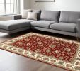 7' X 10' Red Ivory Machine Woven Floral Oriental Indoor Area Rug