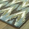 7' X 10' Gray And Taupe Ikat Pattern Area Rug